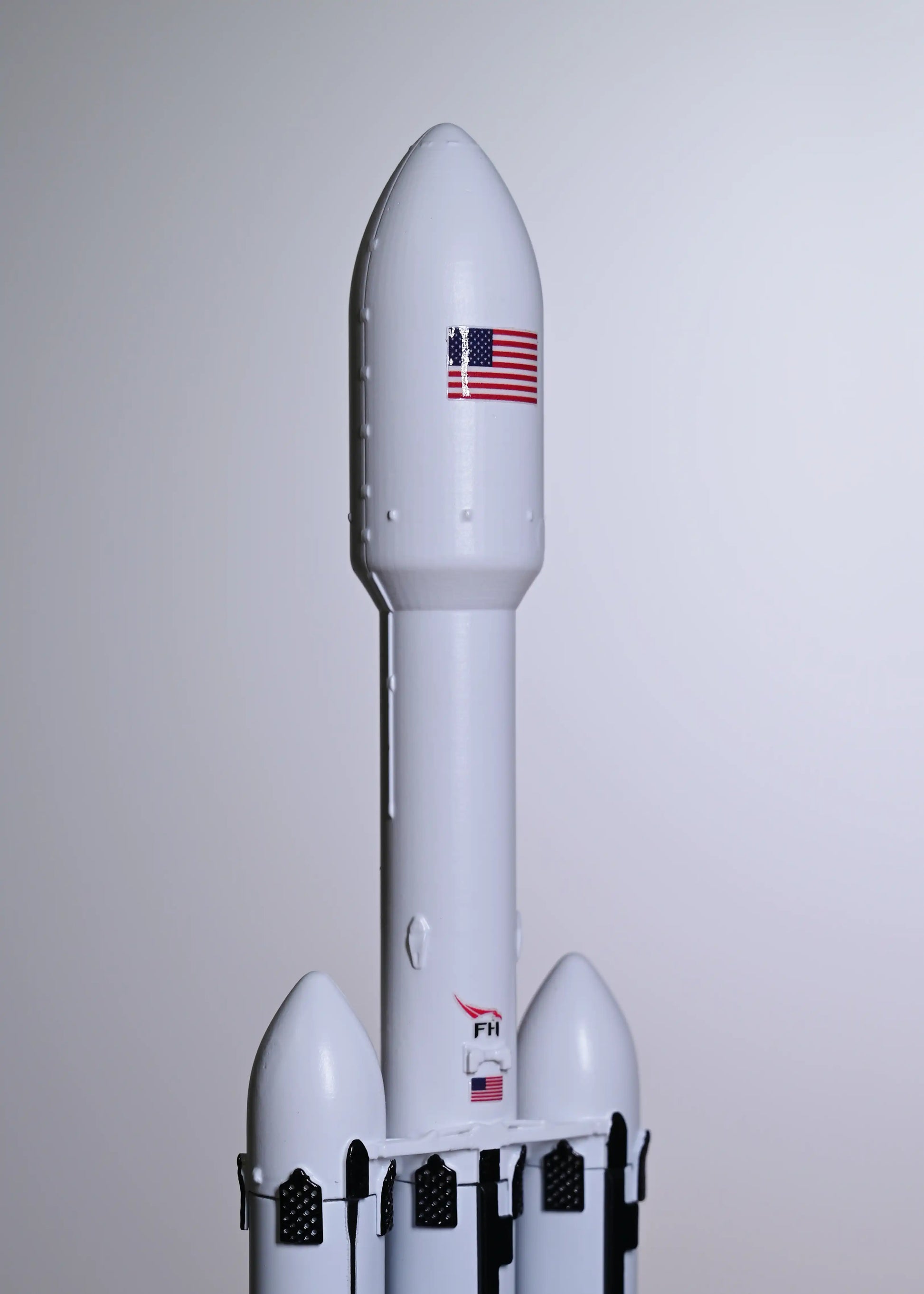 The main fairing with the US flag on the Falcon Heavy rocket