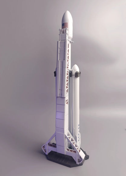 SpaceX Falcon Heavy on the launch table, rear view, detailed launch tower. Model in 1:200 scale
