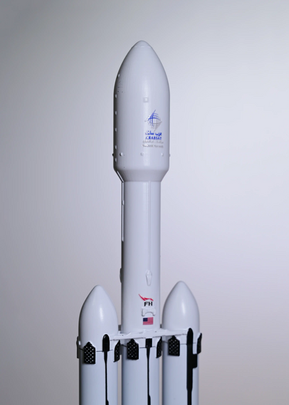 The main fairing with the ArabSat mission logo on the Falcon Heavy rocket