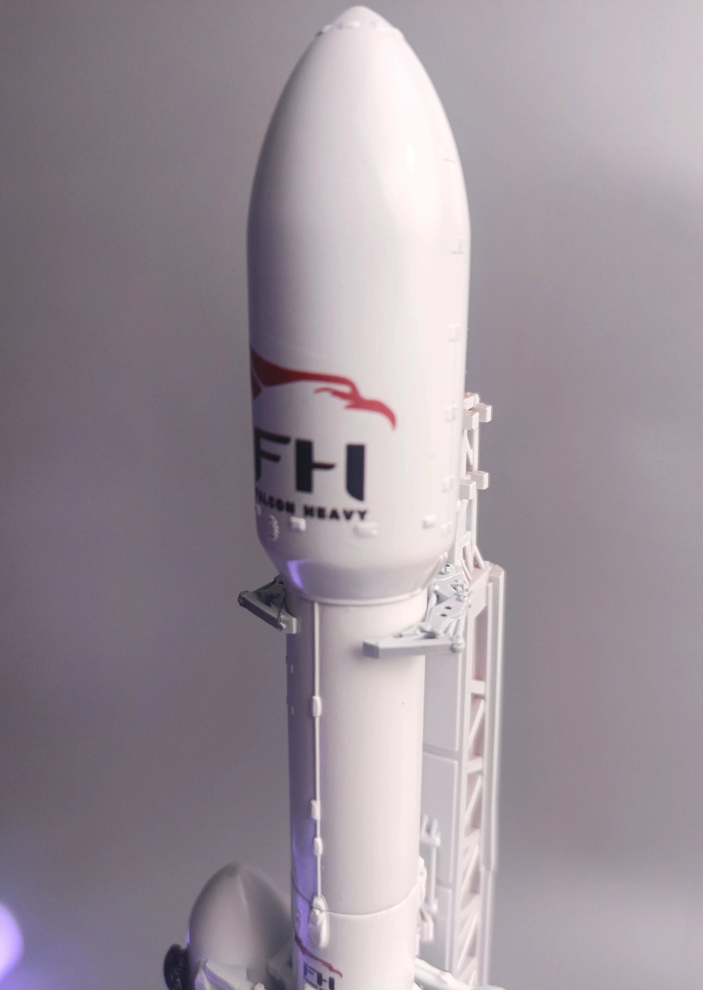 Falcon Heavy logo on the main fairing of the Falcon Heavy rocket. Model 1:200