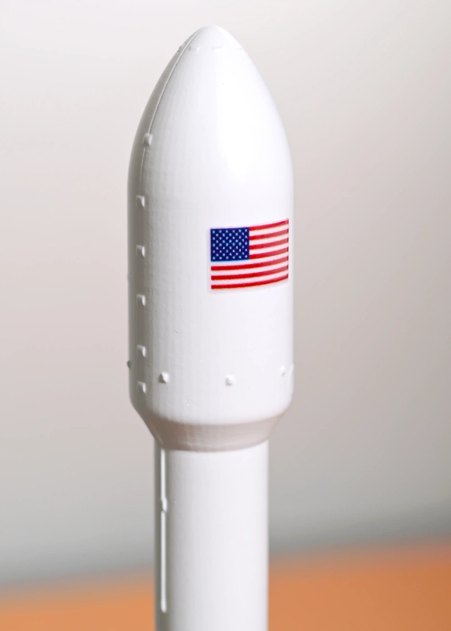SpaceX Falcon 9 main fairing with the US flag